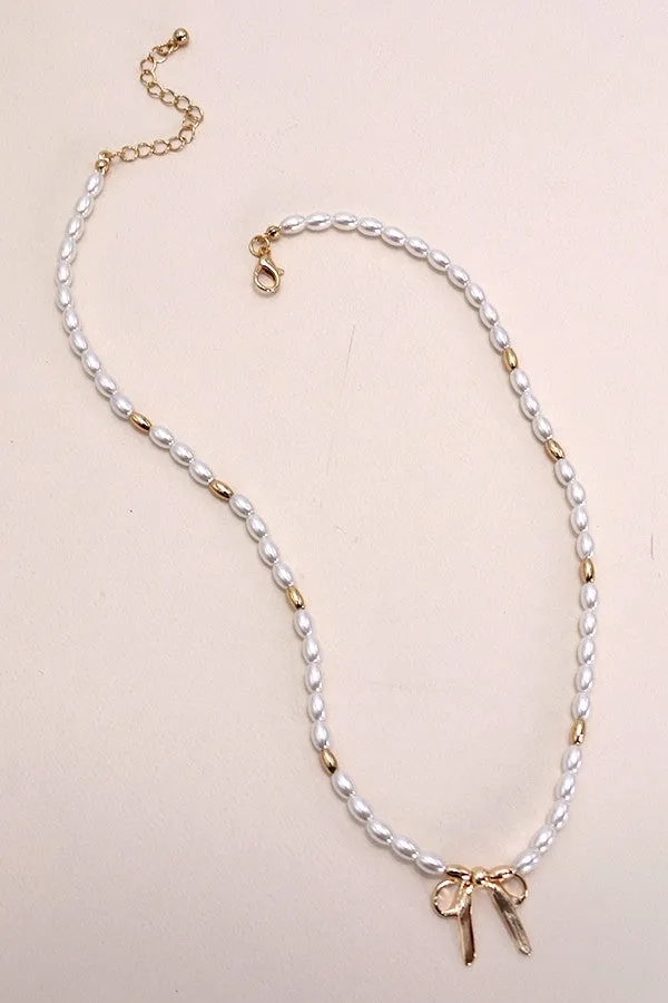 Pearl and Gold Bead Bow Pendant Necklace