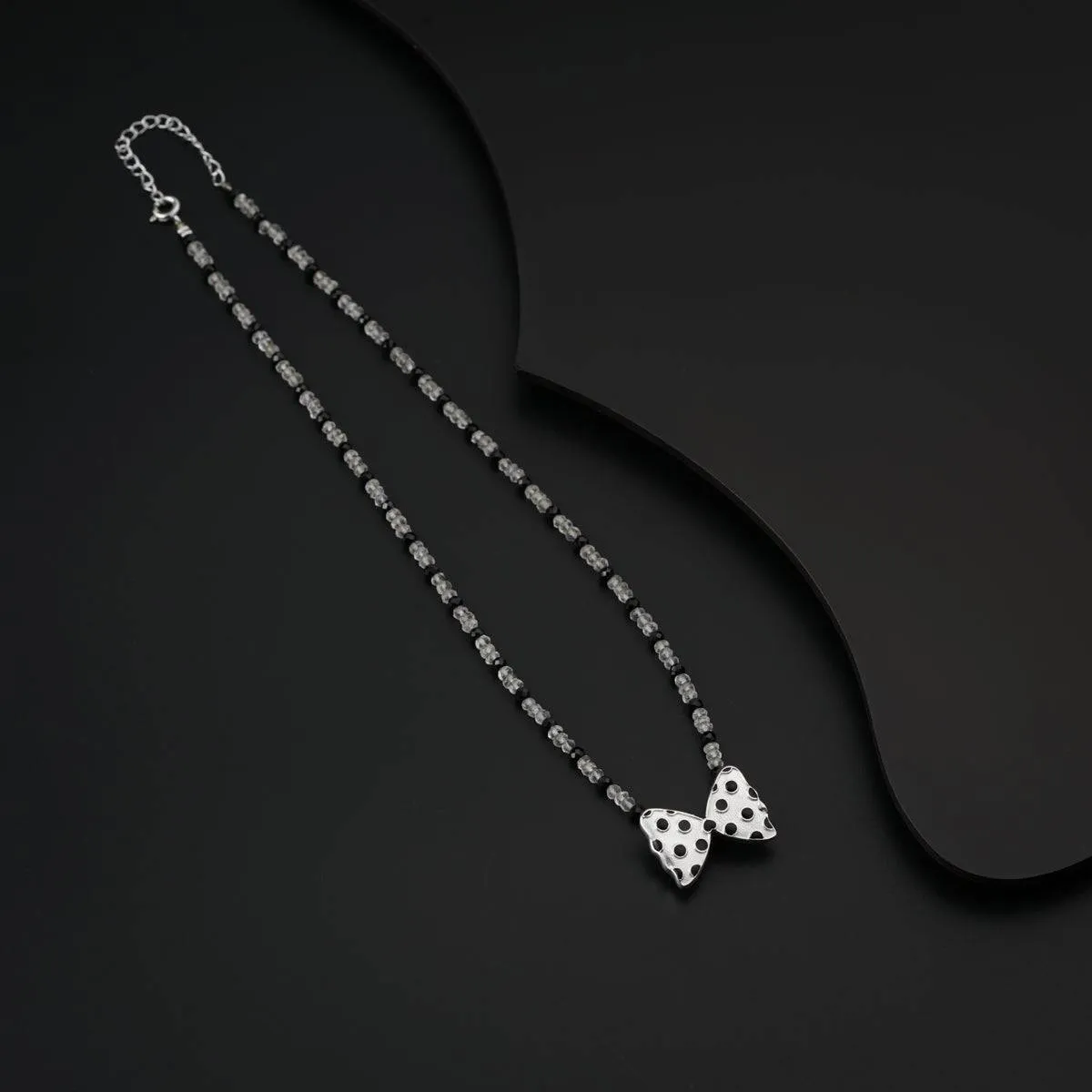 Polka Dots Bow Necklace with Crystals and Black Spinels