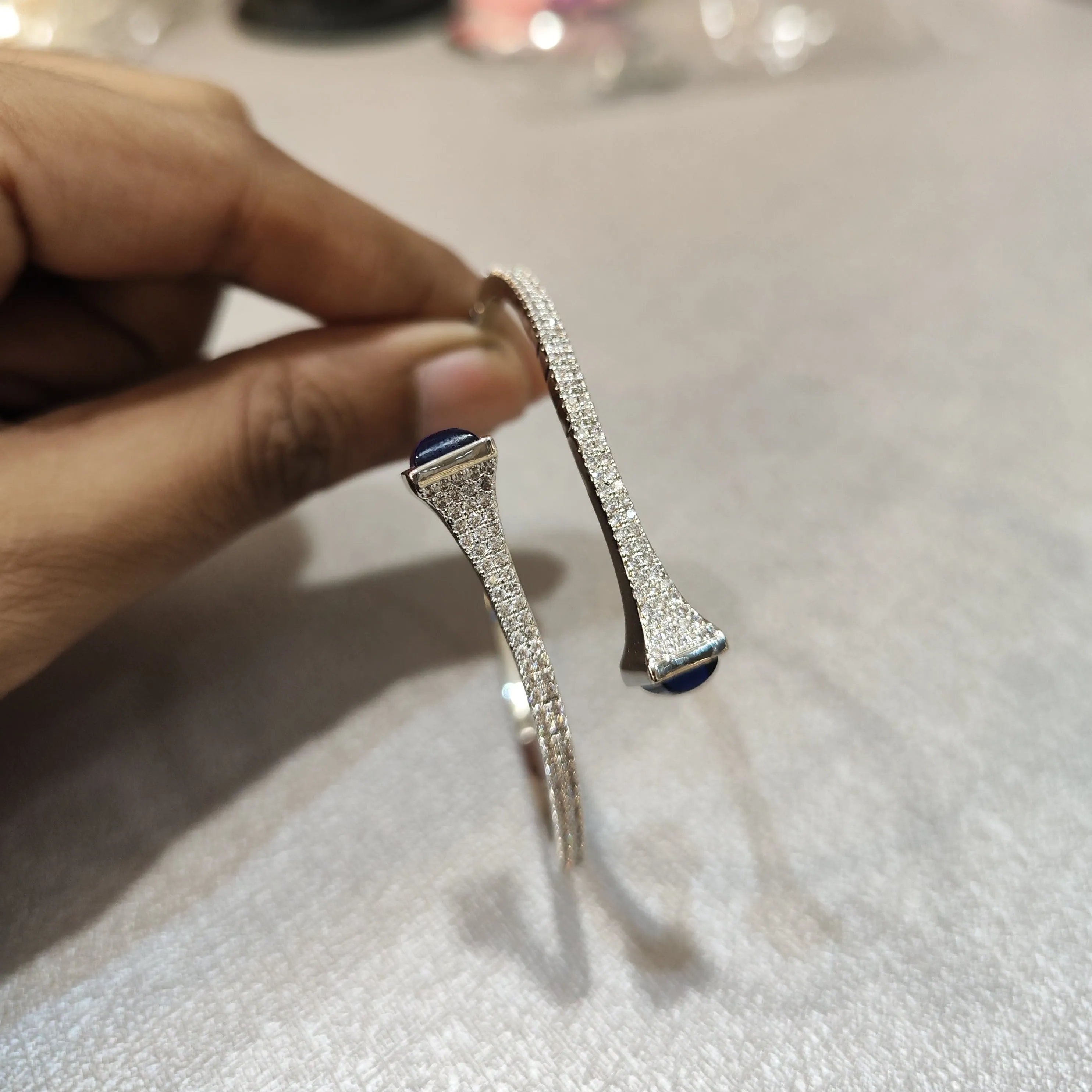 Sleek Silver Bracelet with Blue Stone