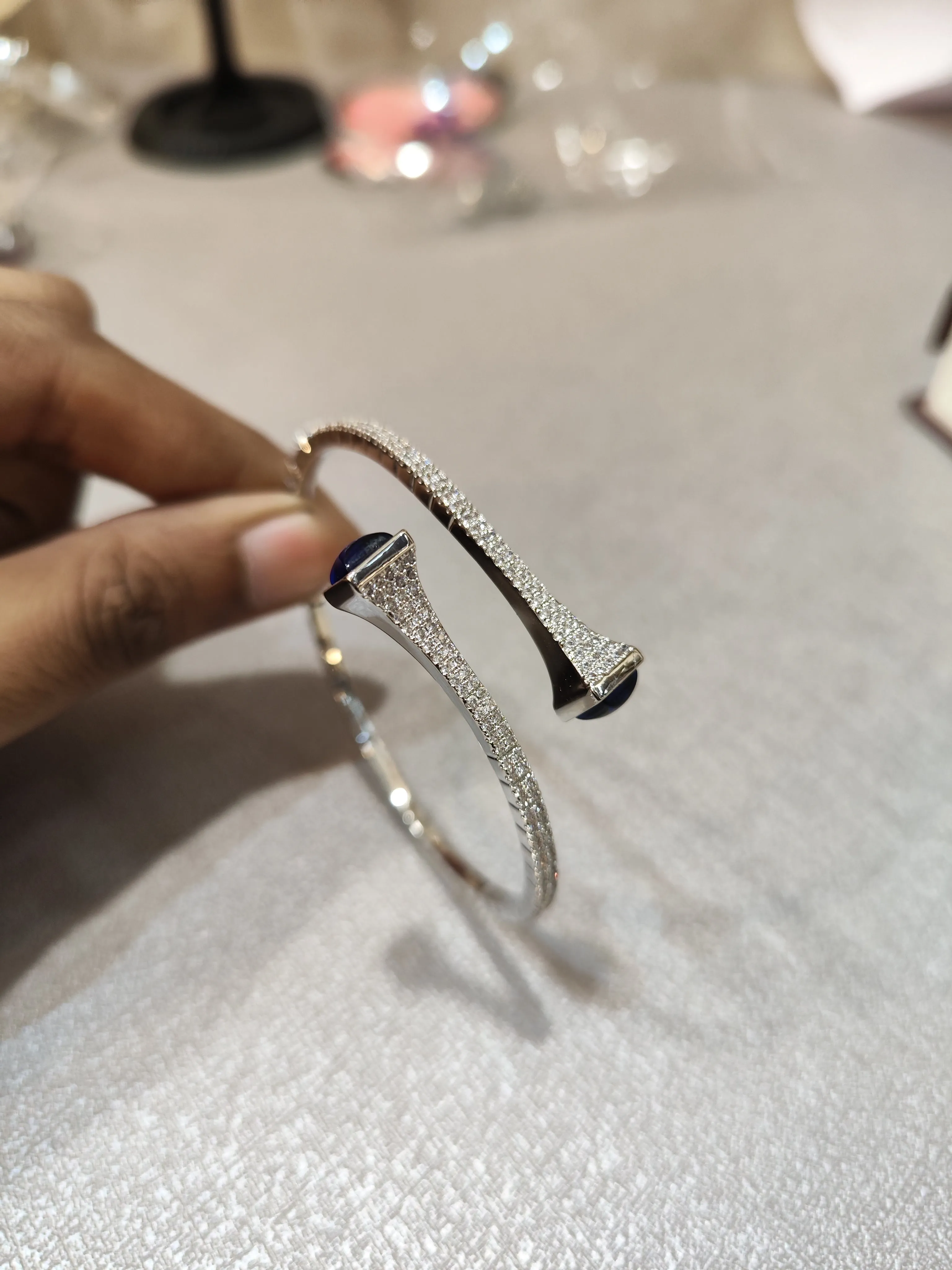 Sleek Silver Bracelet with Blue Stone