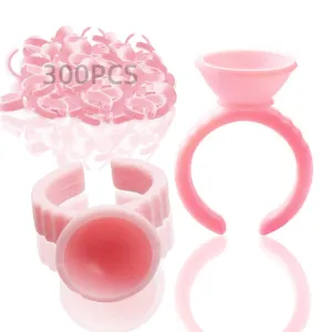 WINMIU 300PCS Disposable Tattoo Lash Glue Rings for Eyelash Extensions, Nail Art Plastic Glue Supplies Rings Cups Holder, Finger Hand Beauty Tools, Pigment Nail Eyelash Glue Ring Holders (Pink)